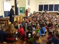 Captain Richard Morgan greets pupils in the morning assembly